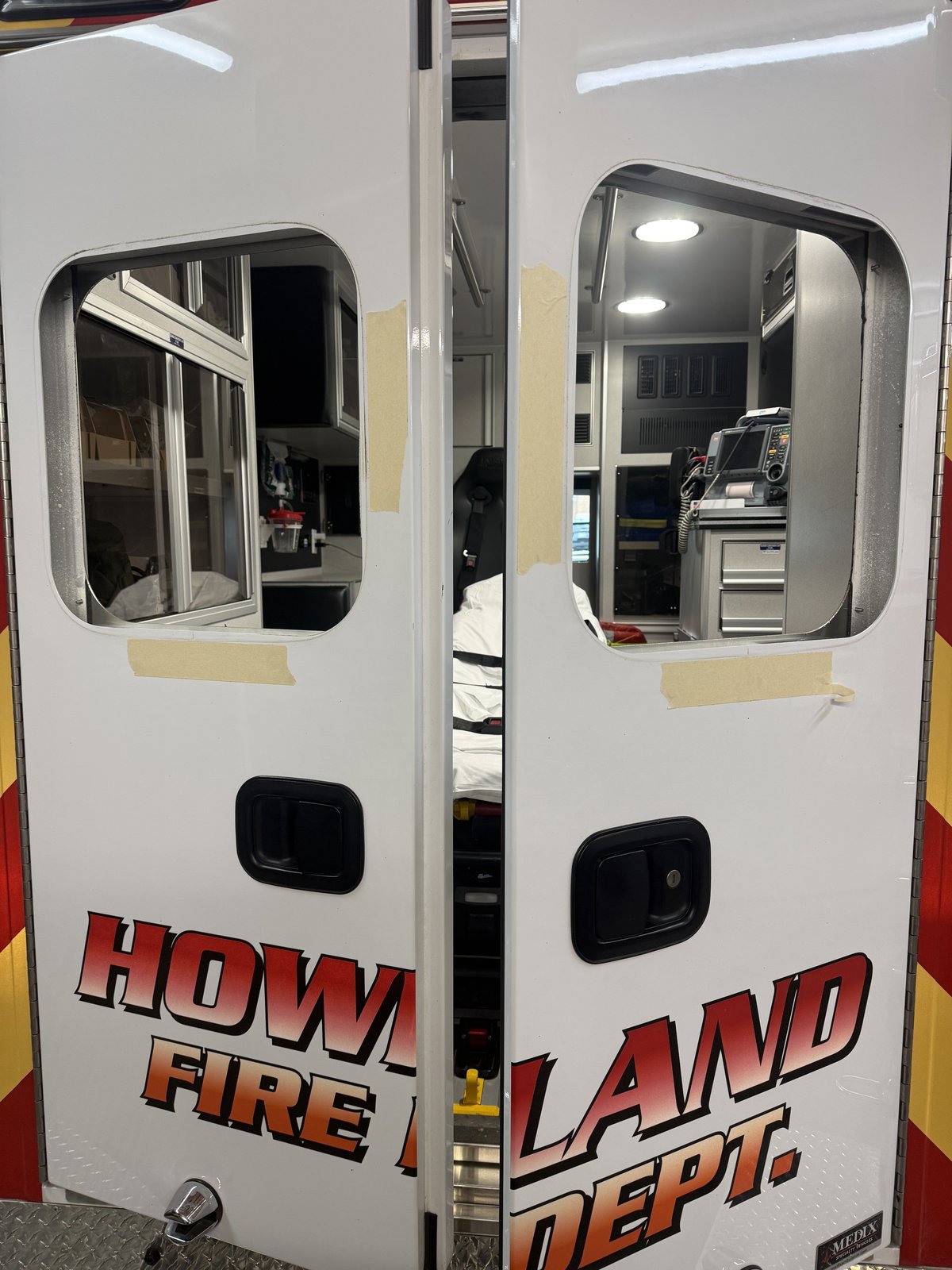 Rear doors of a Howland Fire Department Medix ambulance during on-site service